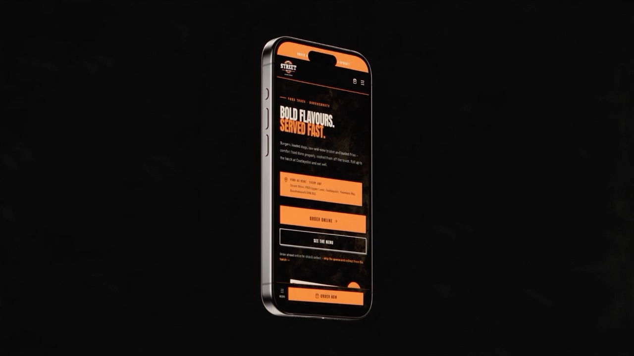 The Street Bites mobile site turned three-quarters to camera, the sticky Order Now bar pinned across the bottom of the screen.