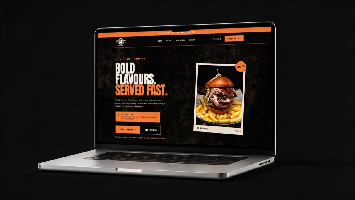 The Street Bites website on a laptop